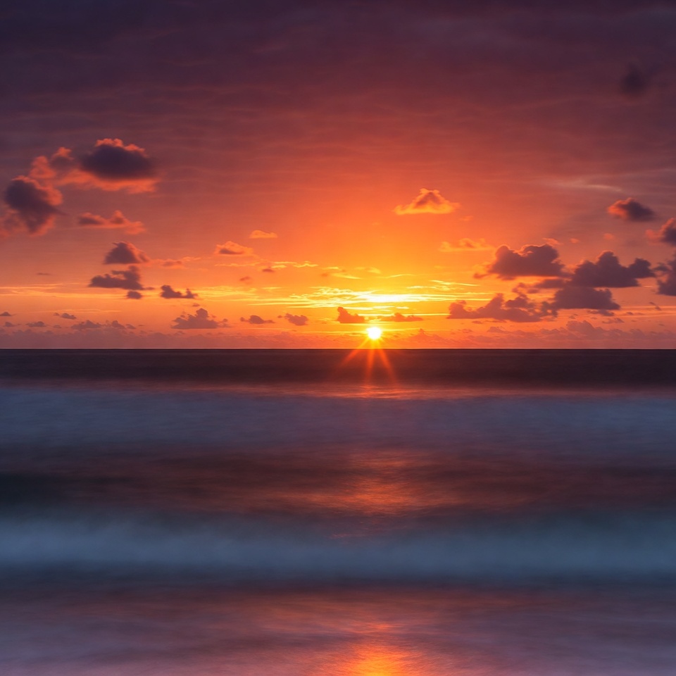 Sunset over ocean with waves Sunset over ocean with waves