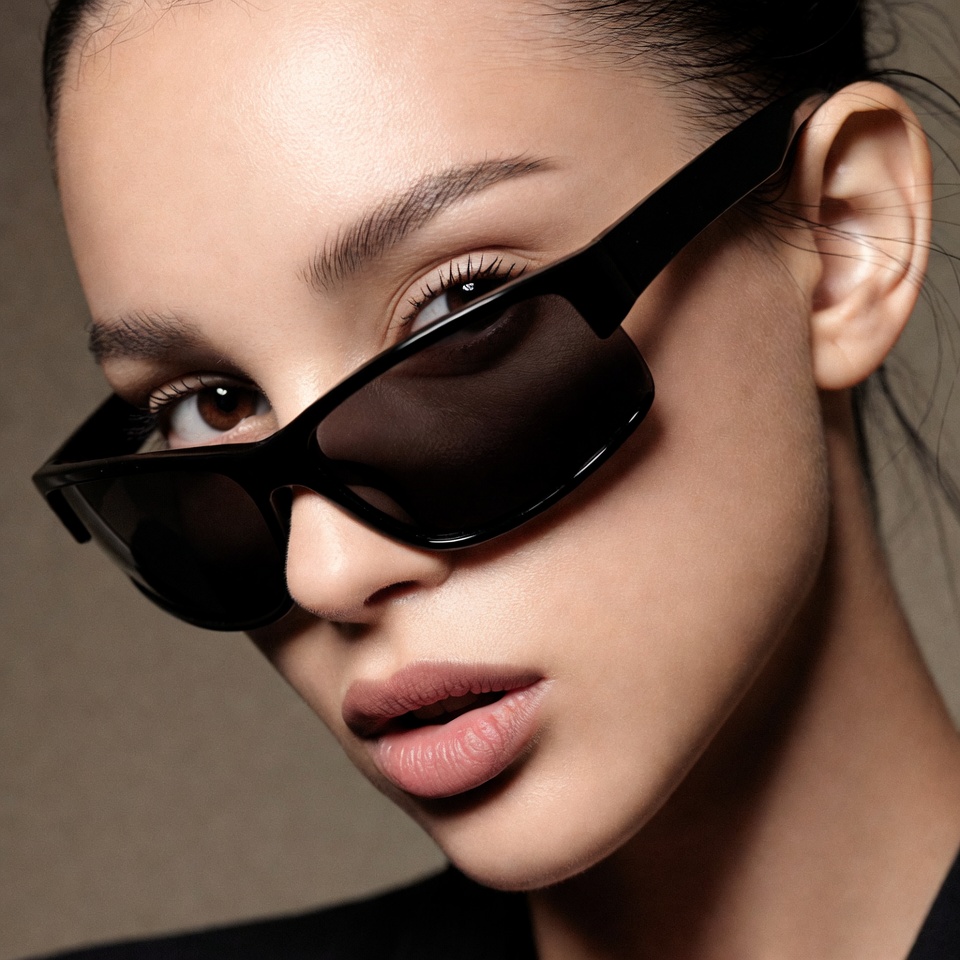 Asian woman wearing black sunglasses Asian woman wearing black sunglasses