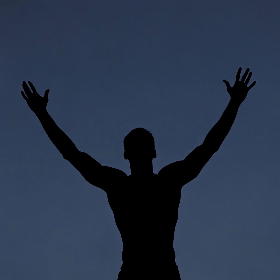 Man raising arms silhouette Man raising arms silhouette