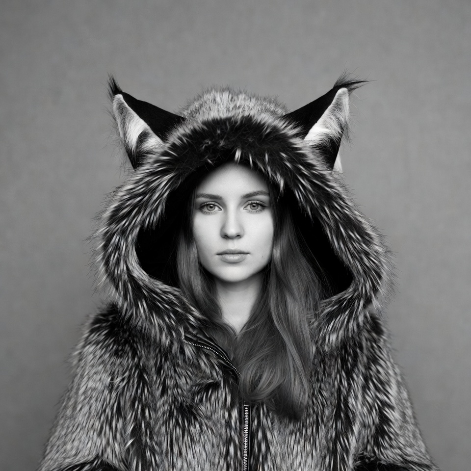 Woman in wolf fur hood Woman in wolf fur hood