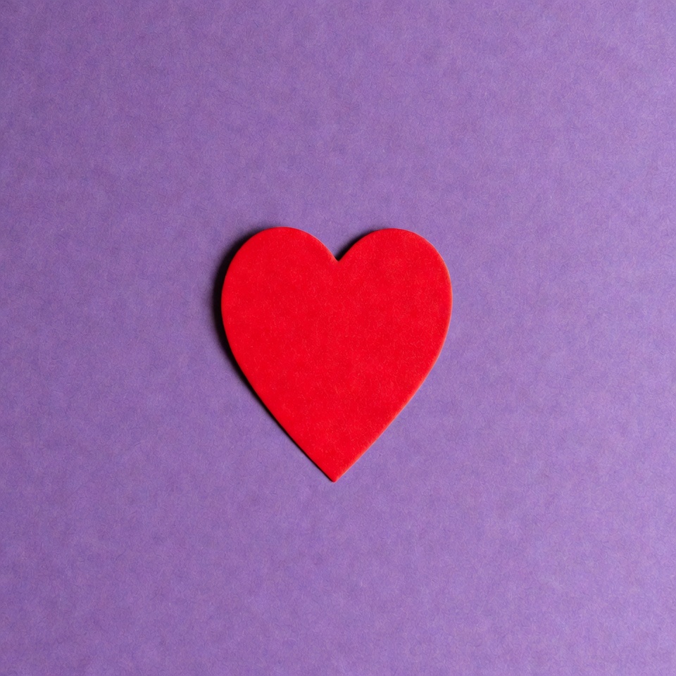 Red heart on purple background Red heart on purple background