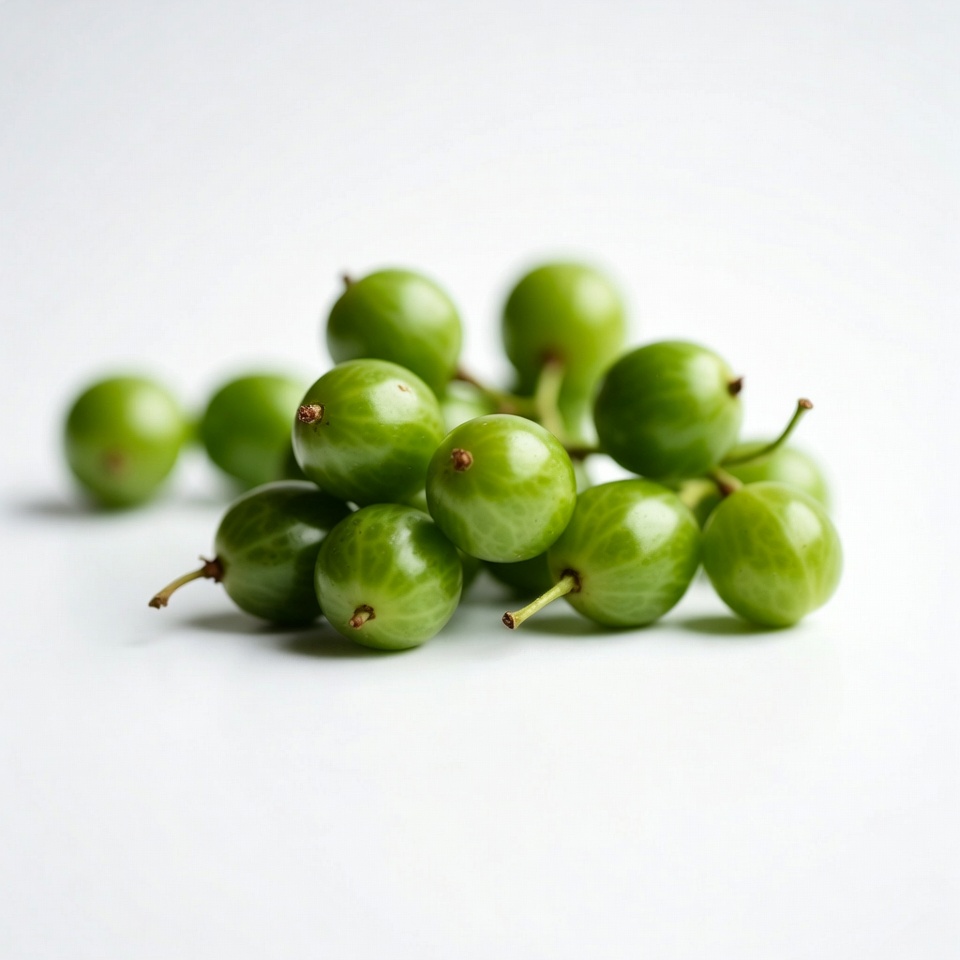 Fresh green gooseberries on white background Fresh green gooseberries on white background