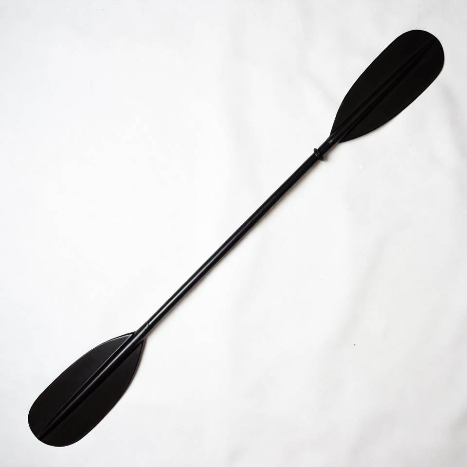 Black kayak paddle isolated Black kayak paddle isolated