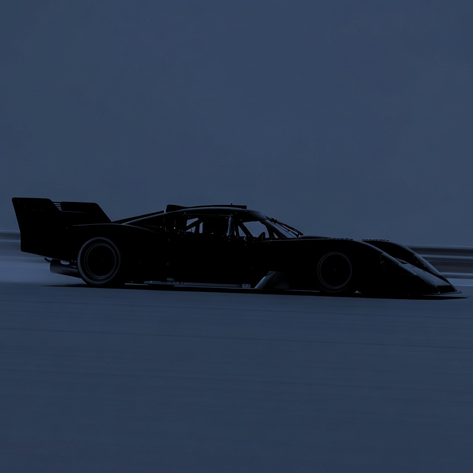 Black silhouette race car speeding Black silhouette race car speeding