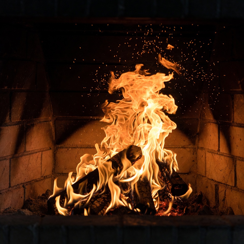 Blazing Fire in Brick Fireplace Blazing Fire in Brick Fireplace