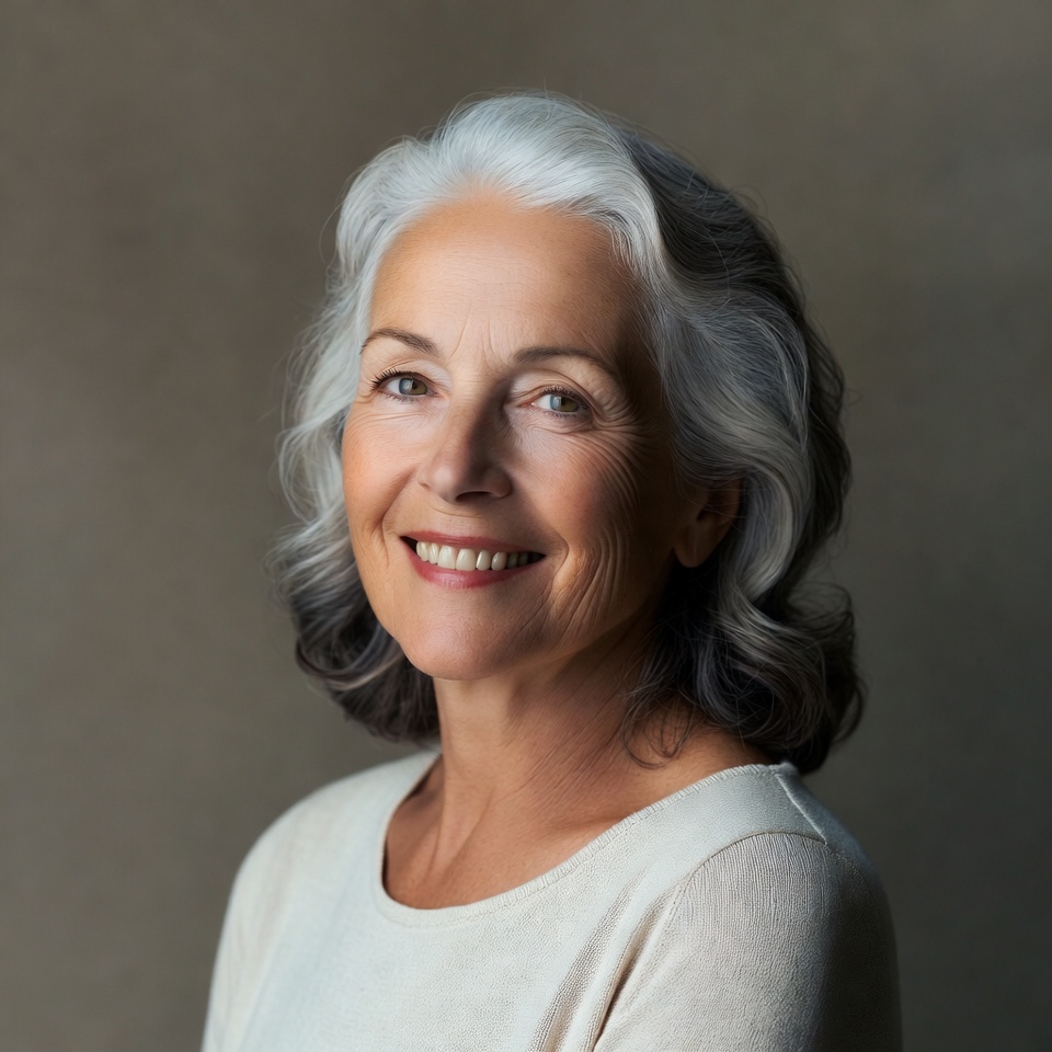 Smiling elderly woman with silver hair Smiling elderly woman with silver hair