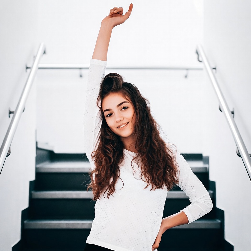 Teen girl posing on stairs Teen girl posing on stairs