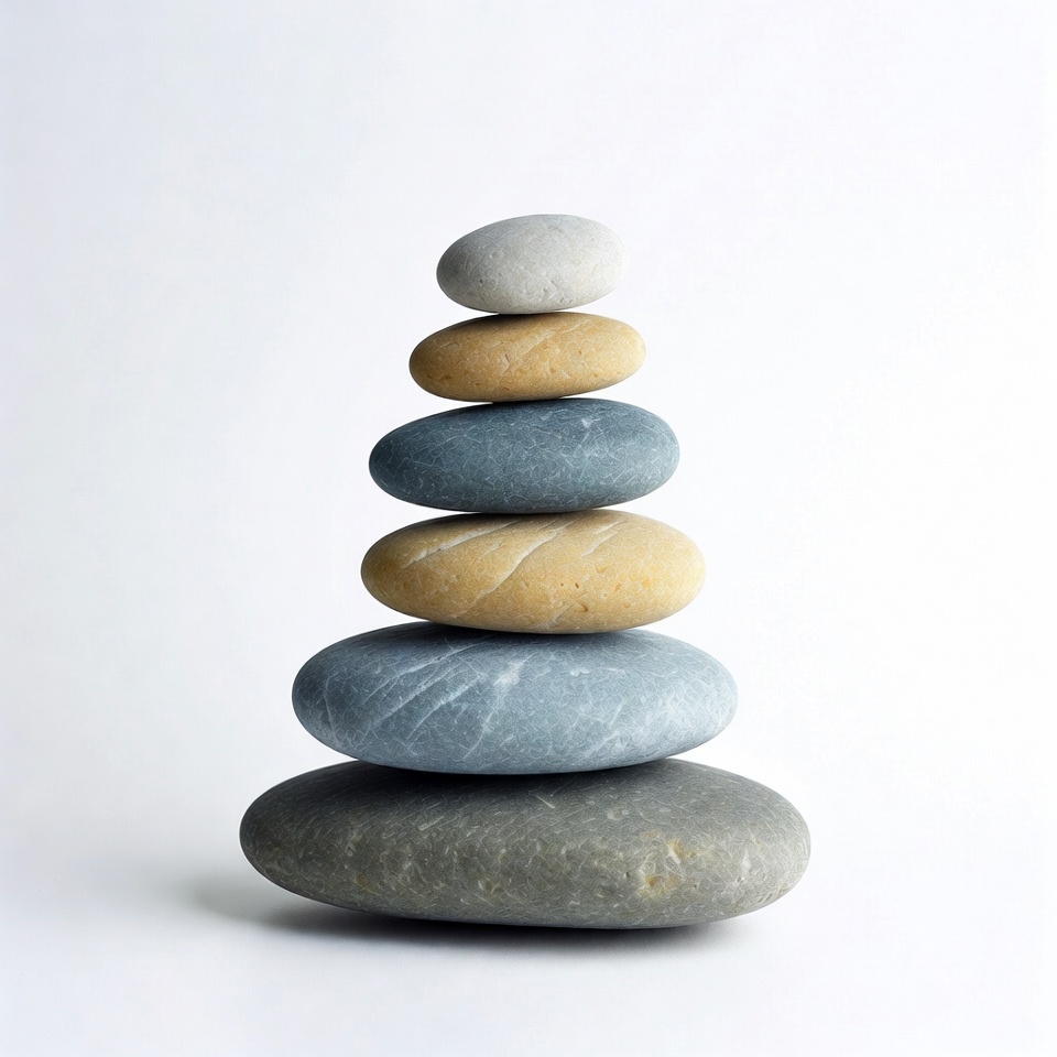 Stacked Pebbles on White Background Stacked Pebbles on White Background