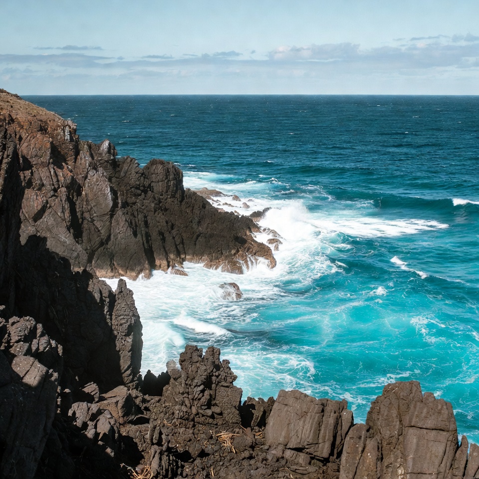 Ocean waves crashing on rocky cliffs Ocean waves crashing on rocky cliffs