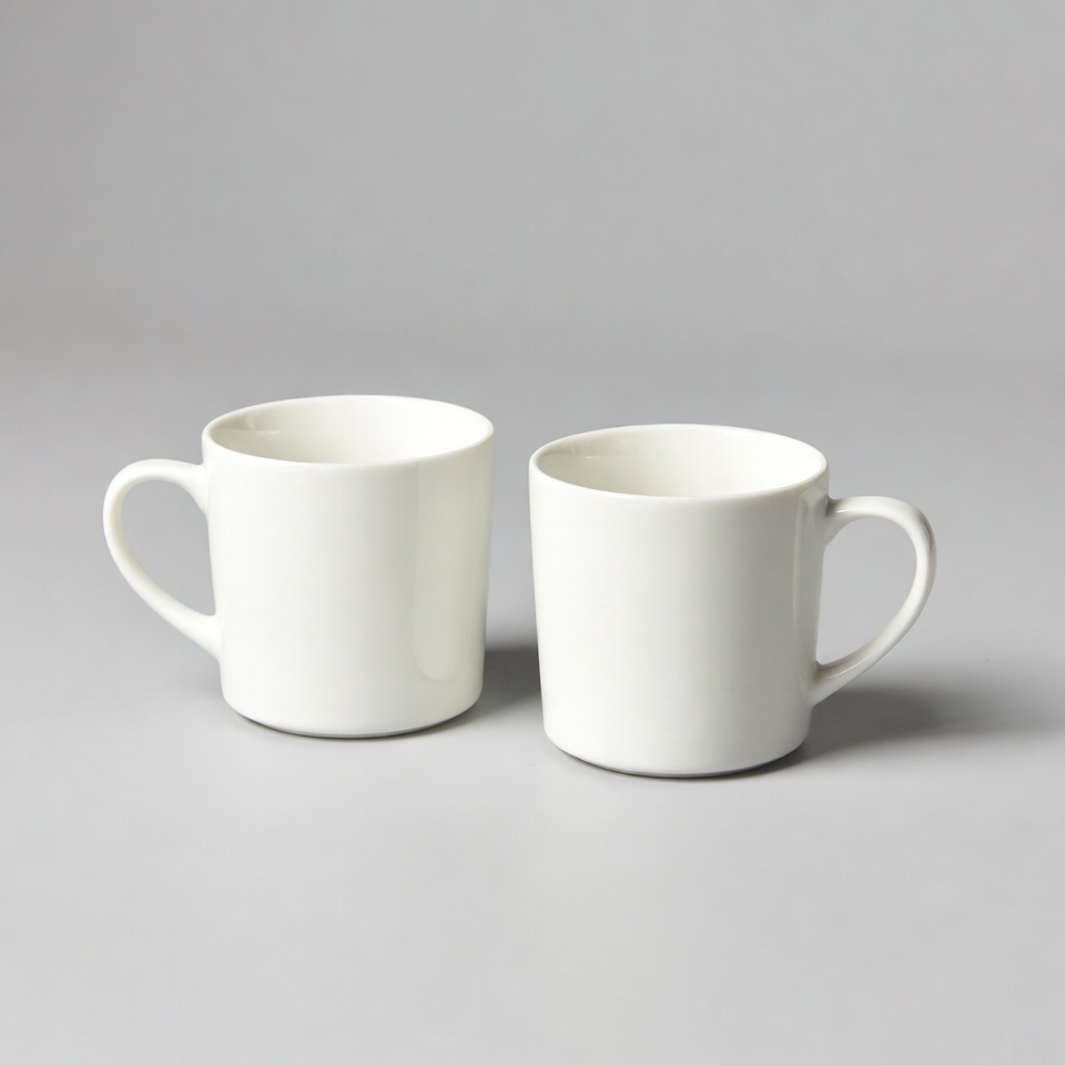 Two White Ceramic Mugs Two White Ceramic Mugs