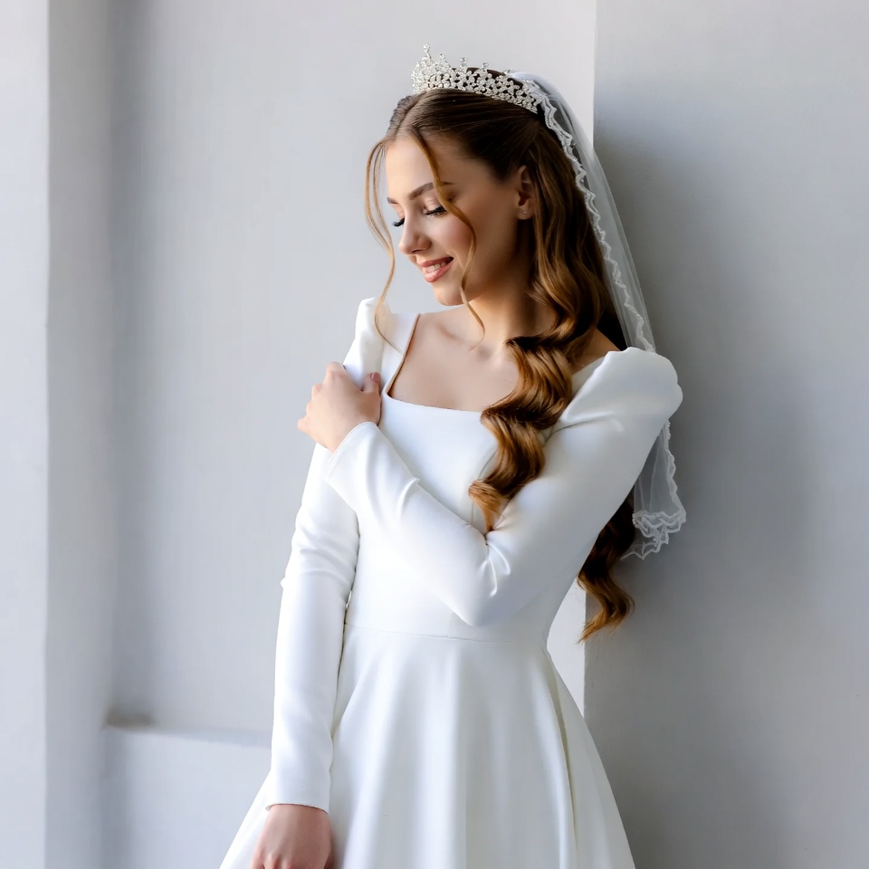 Bride in white lace gown with tiara Bride in white lace gown with tiara