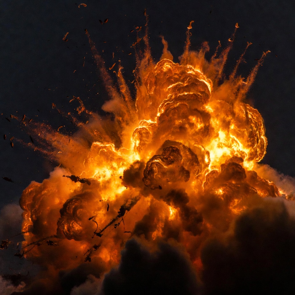 Massive fiery explosion in dark sky Massive fiery explosion in dark sky