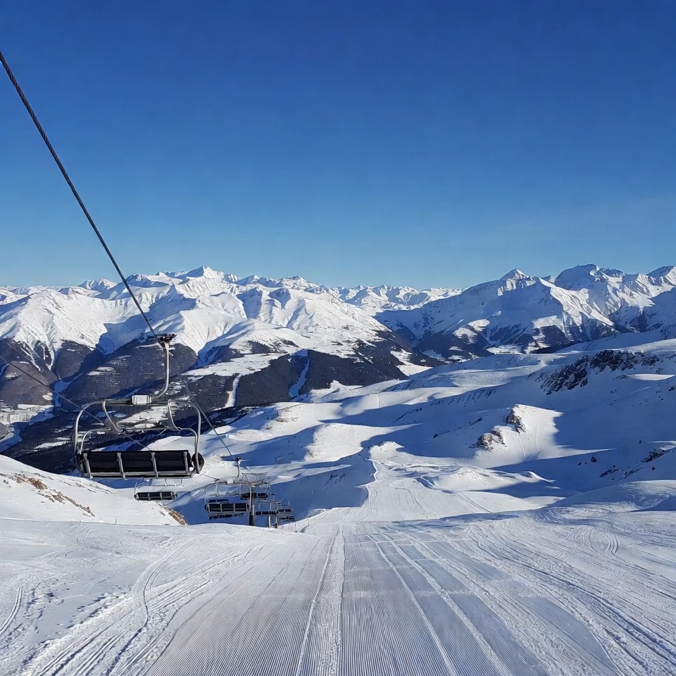 Ski Lift Over Snowy Mountains Ski Lift Over Snowy Mountains