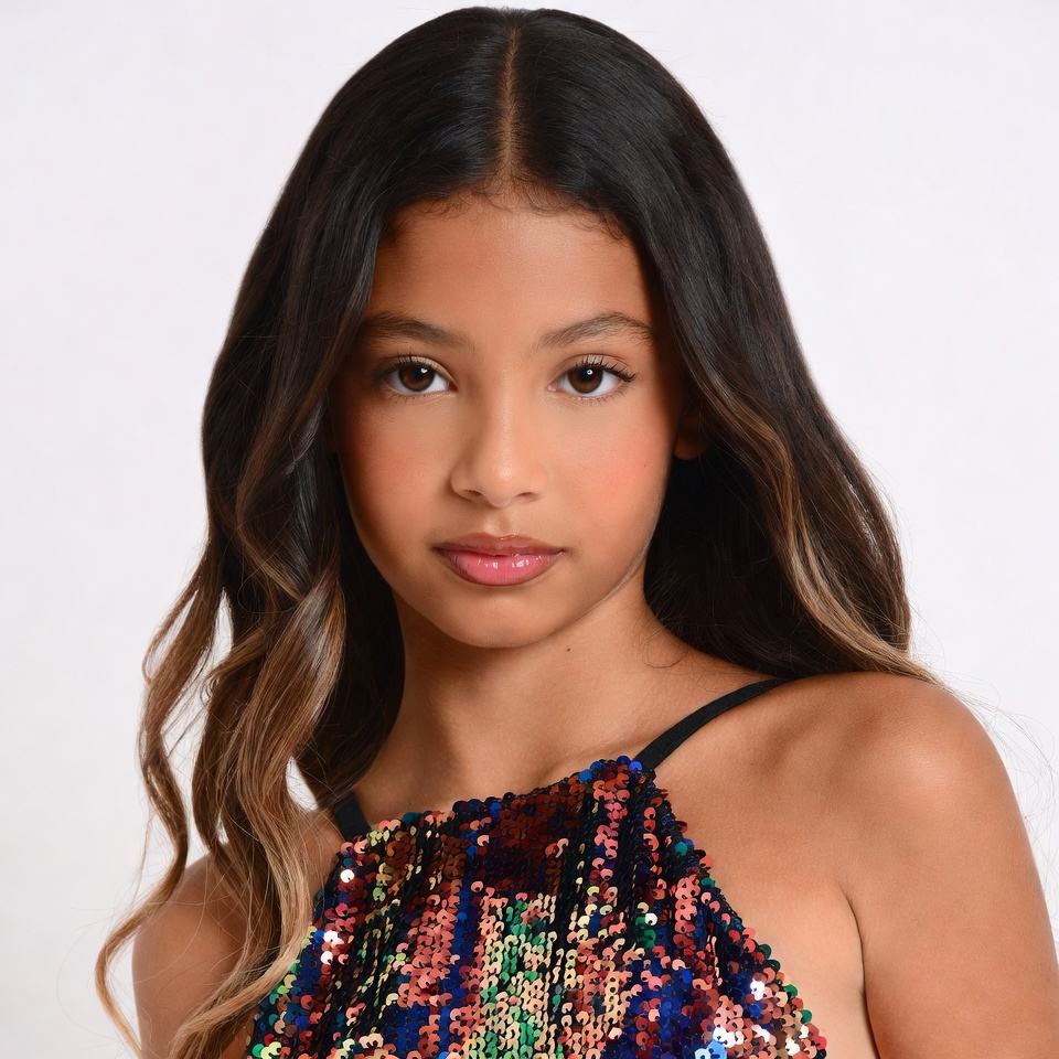 Young girl in colorful sequin top Young girl in colorful sequin top