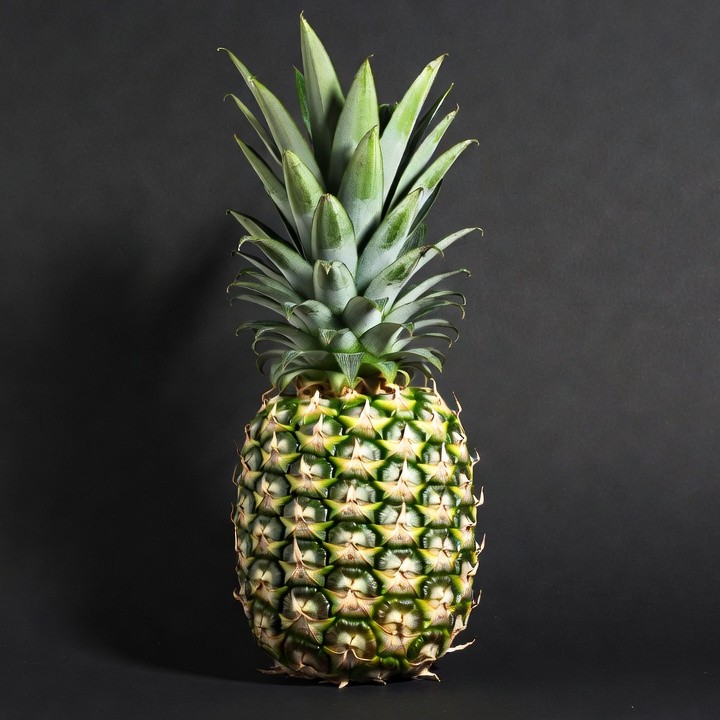 Fresh Pineapple on Black Background Fresh Pineapple on Black Background
