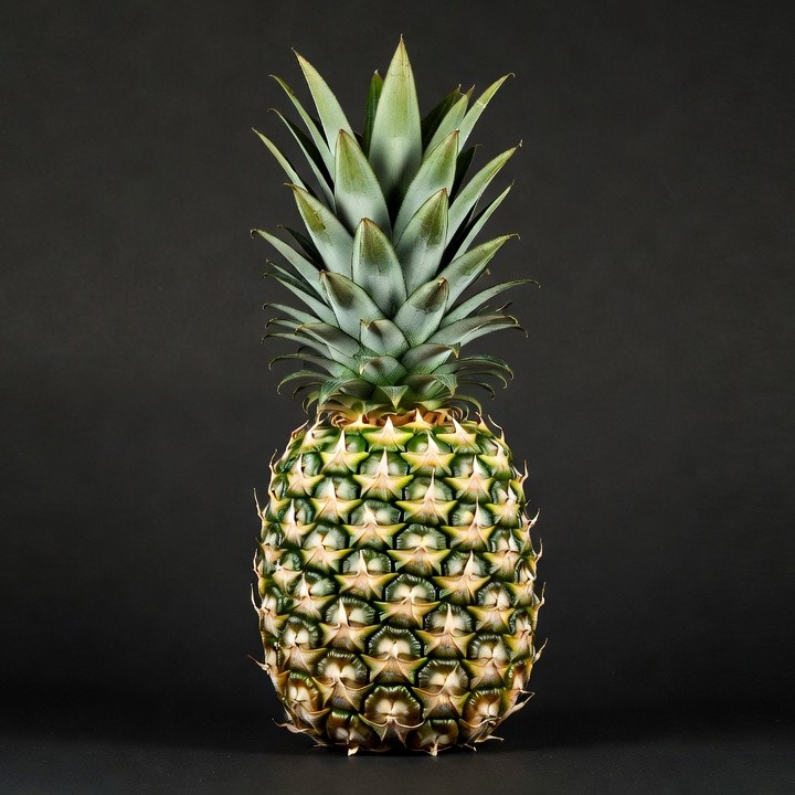 Fresh Pineapple on Black Background Fresh Pineapple on Black Background