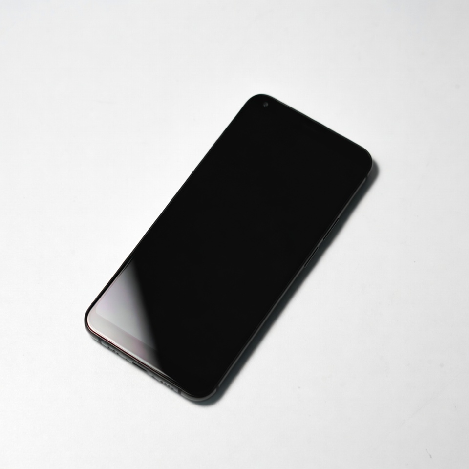 Black smartphone on white background Black smartphone on white background