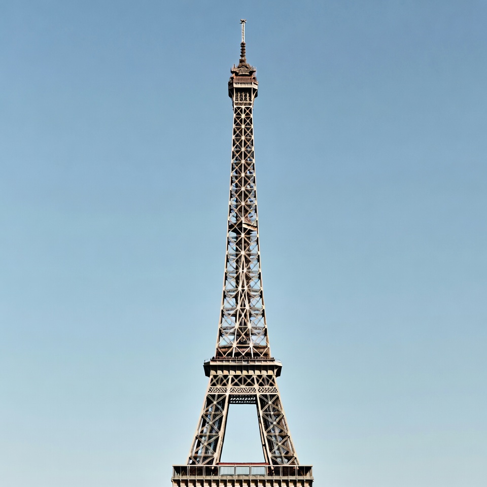 Eiffel Tower against blue sky Eiffel Tower against blue sky