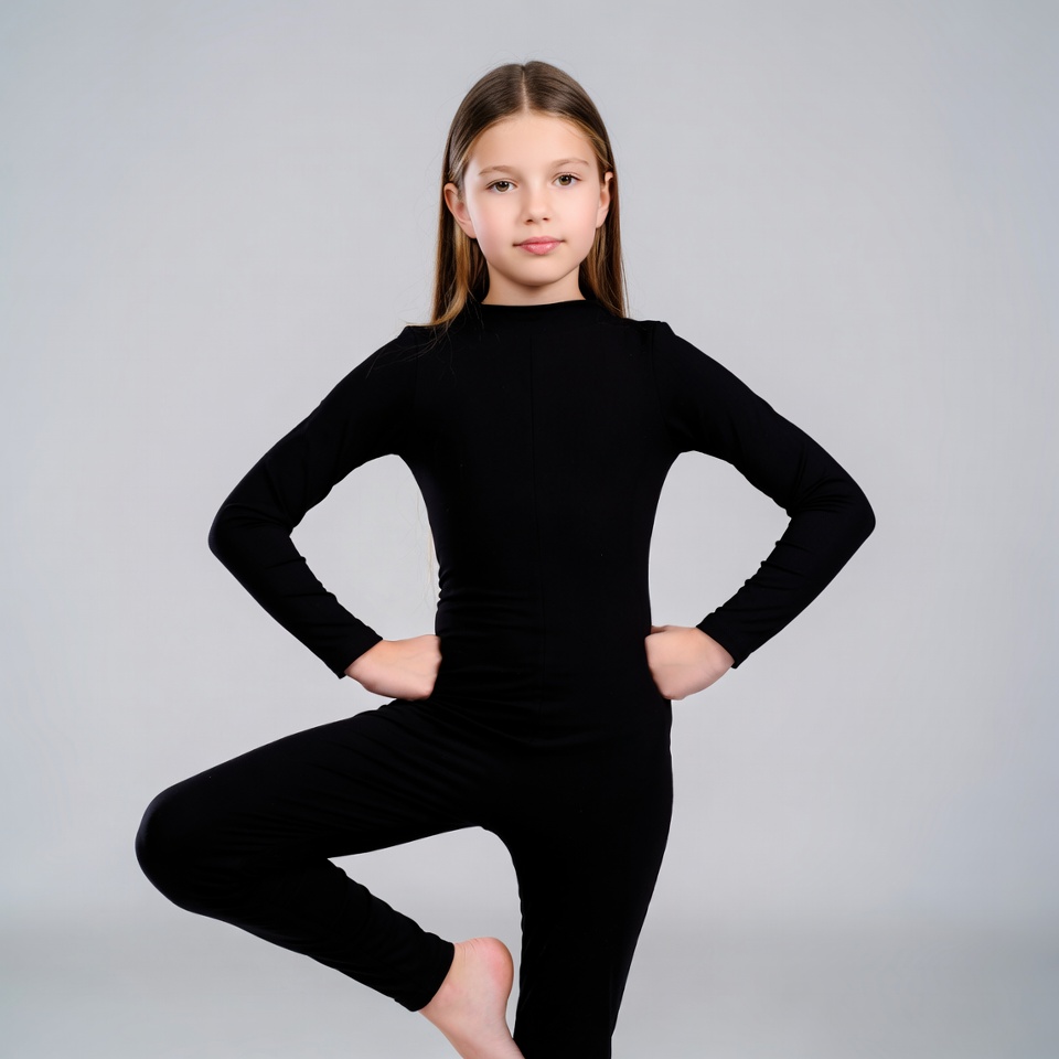 Girl doing tree pose yoga Girl doing tree pose yoga