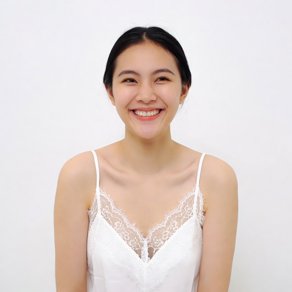 Asian woman smiling in white lace top Asian woman smiling in white lace top
