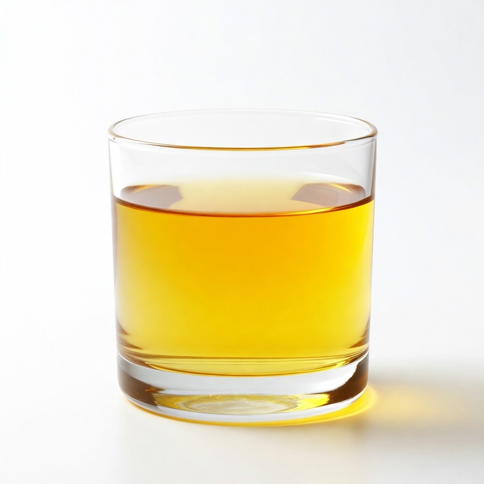 Glass of amber liquid Glass of amber liquid