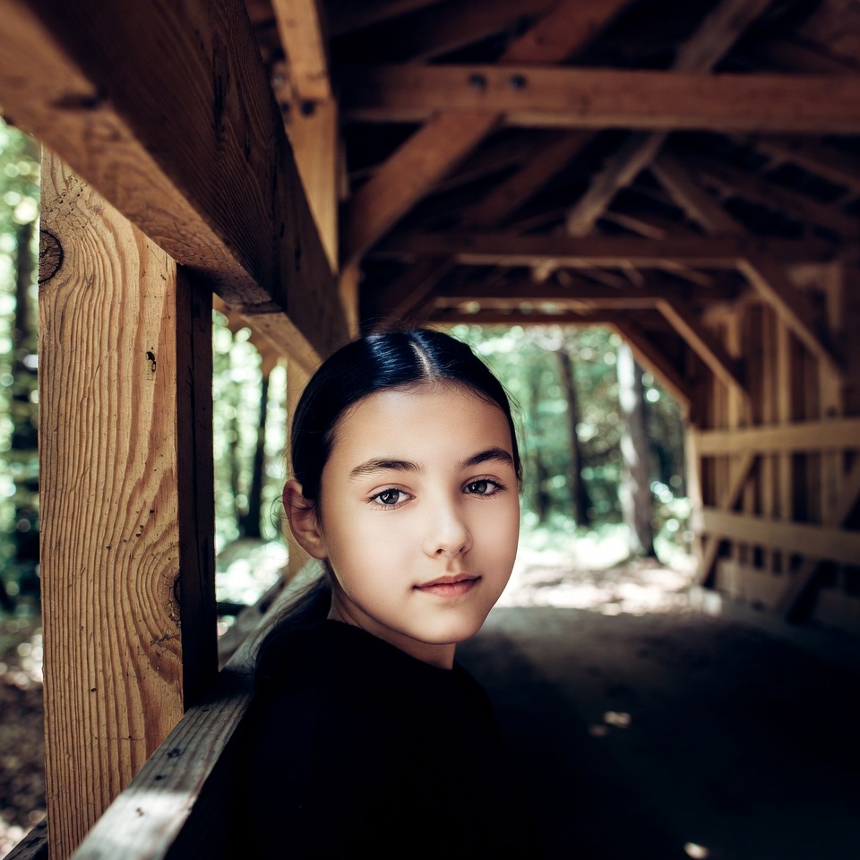 Asian girl in wooden covered bridge Asian girl in wooden covered bridge