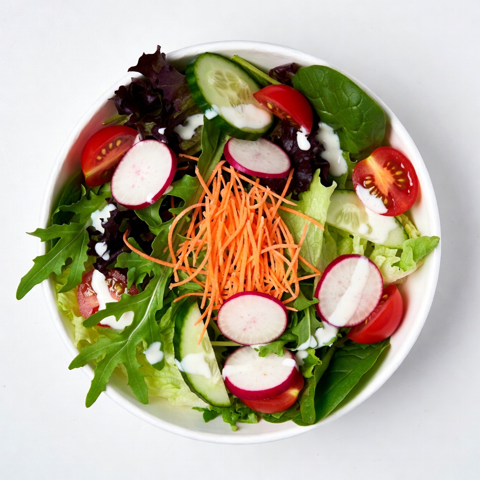 Fresh Mixed Salad in White Bowl Fresh Mixed Salad in White Bowl