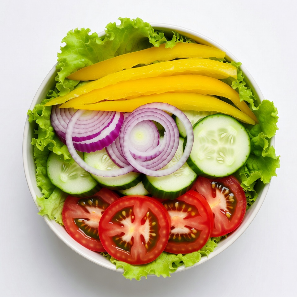 Fresh vegetable salad in white bowl Fresh vegetable salad in white bowl