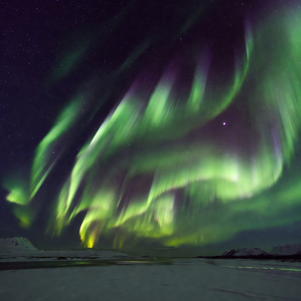 Northern Lights over Snowy Landscape Northern Lights over Snowy Landscape