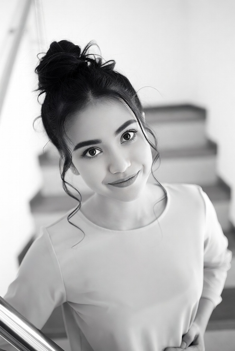 Asian woman smiling on stairs Asian woman smiling on stairs