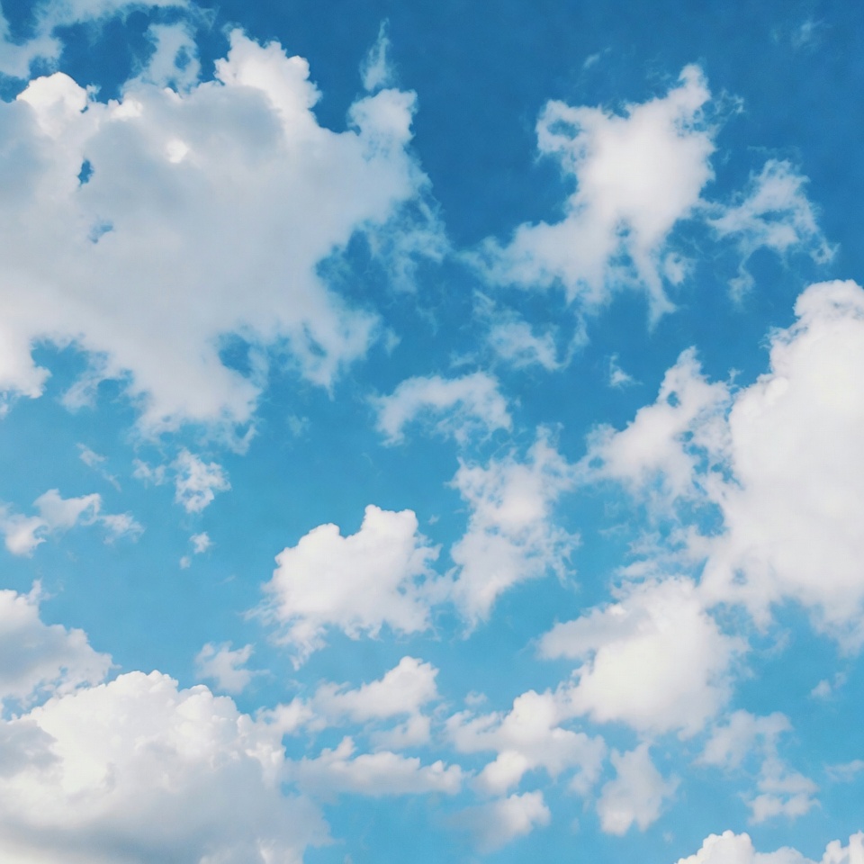 Fluffy White Clouds in Blue Sky Fluffy White Clouds in Blue Sky