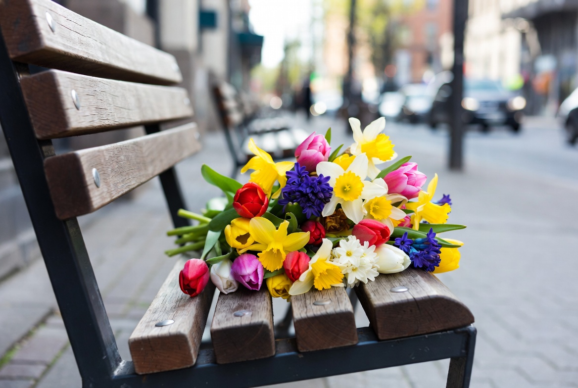 Colorful tulips bouquet on park bench Colorful tulips bouquet on park bench