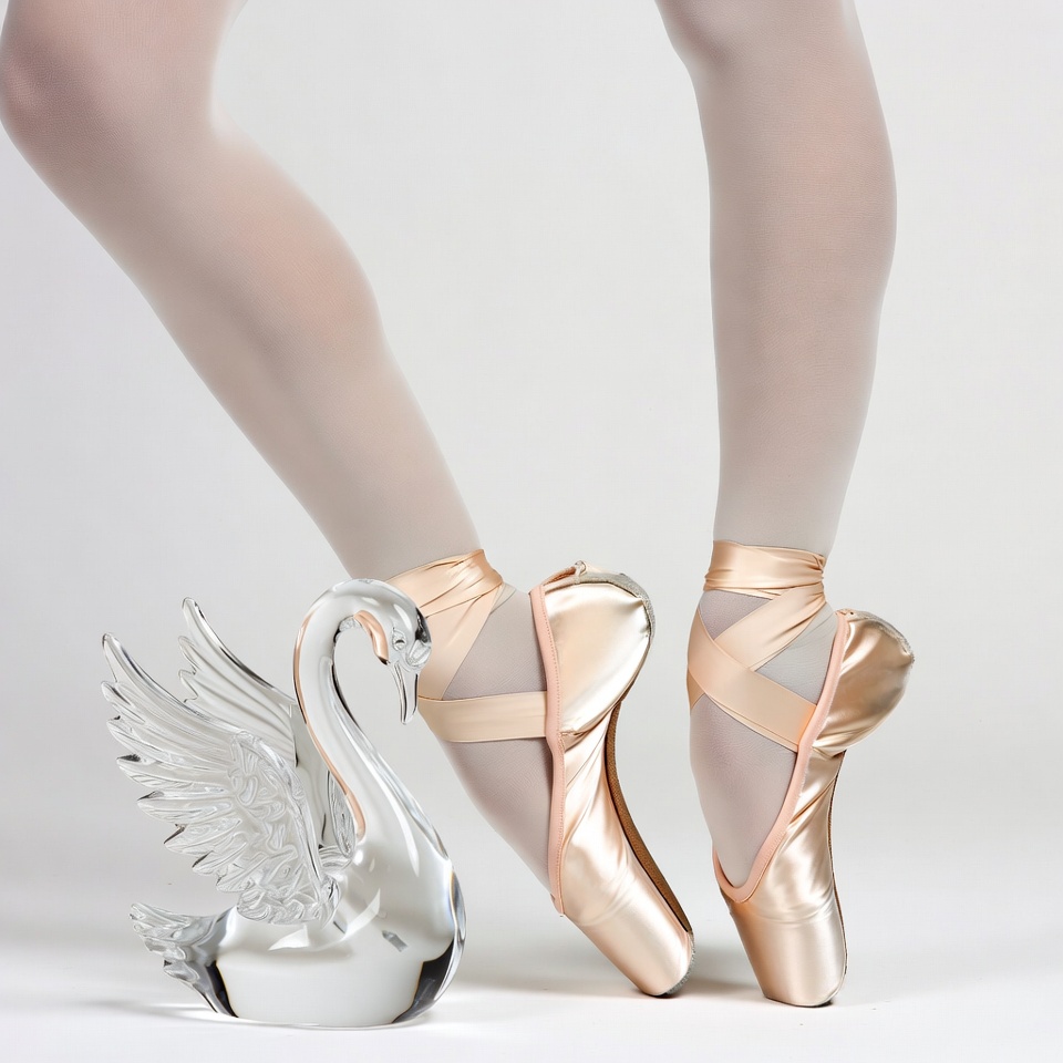 Ballerina legs with crystal swan Ballerina legs with crystal swan