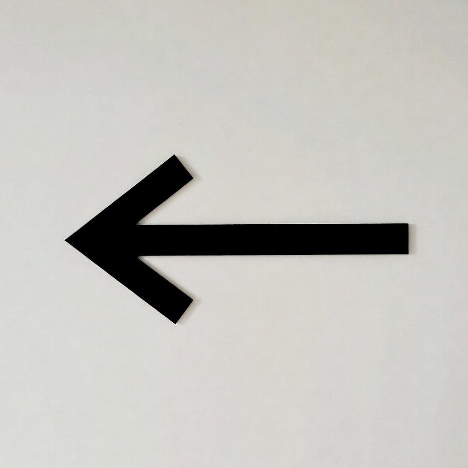 Black left arrow isolated Black left arrow isolated