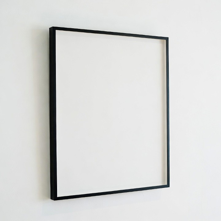 Empty Black Picture Frame on Wall Empty Black Picture Frame on Wall