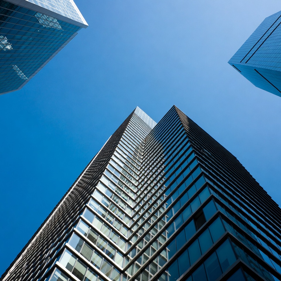 Modern Skyscrapers Against Blue Sky Modern Skyscrapers Against Blue Sky