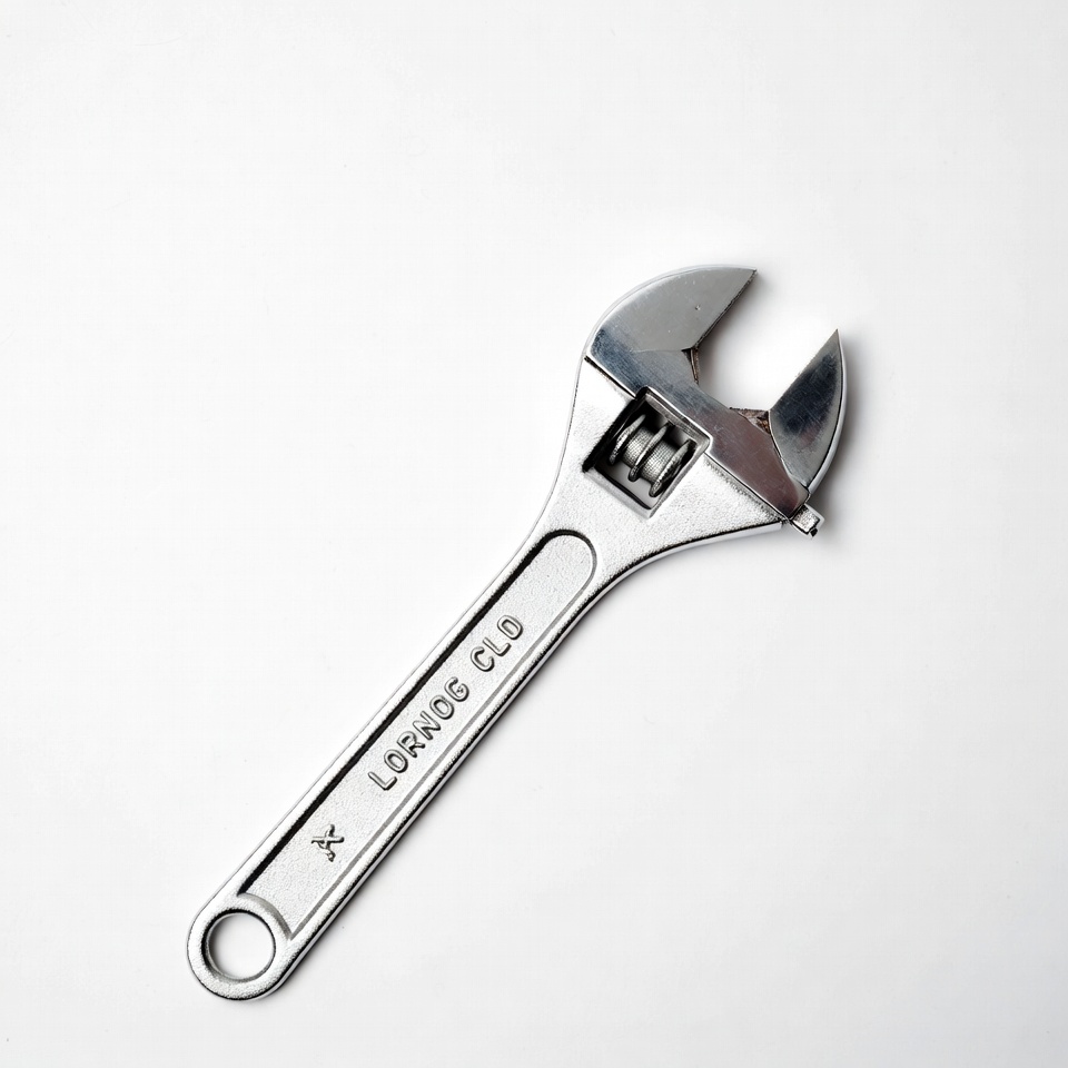 Silver adjustable wrench on white Silver adjustable wrench on white