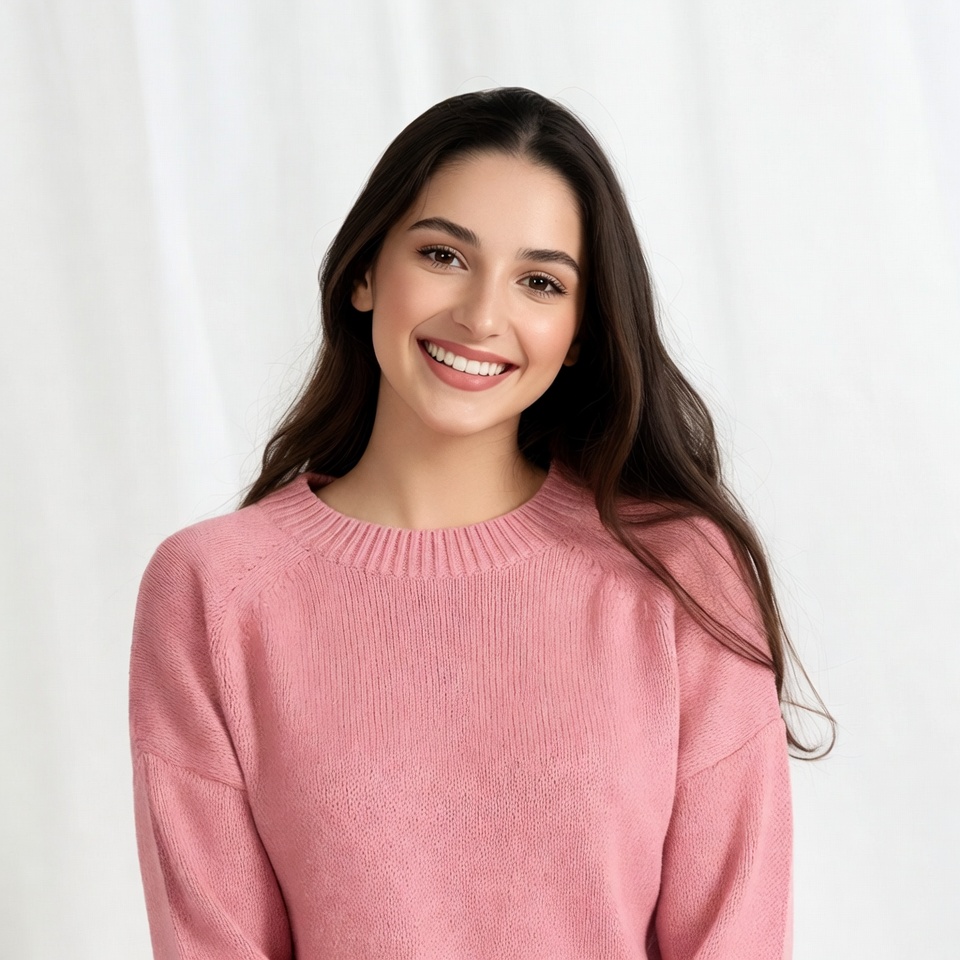 Smiling woman in pink sweater Smiling woman in pink sweater