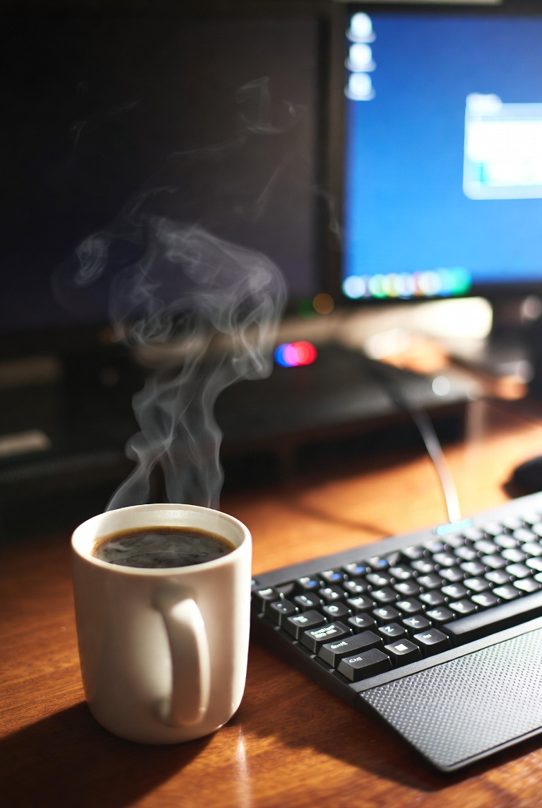 Steaming Coffee Cup on Desk Steaming Coffee Cup on Desk
