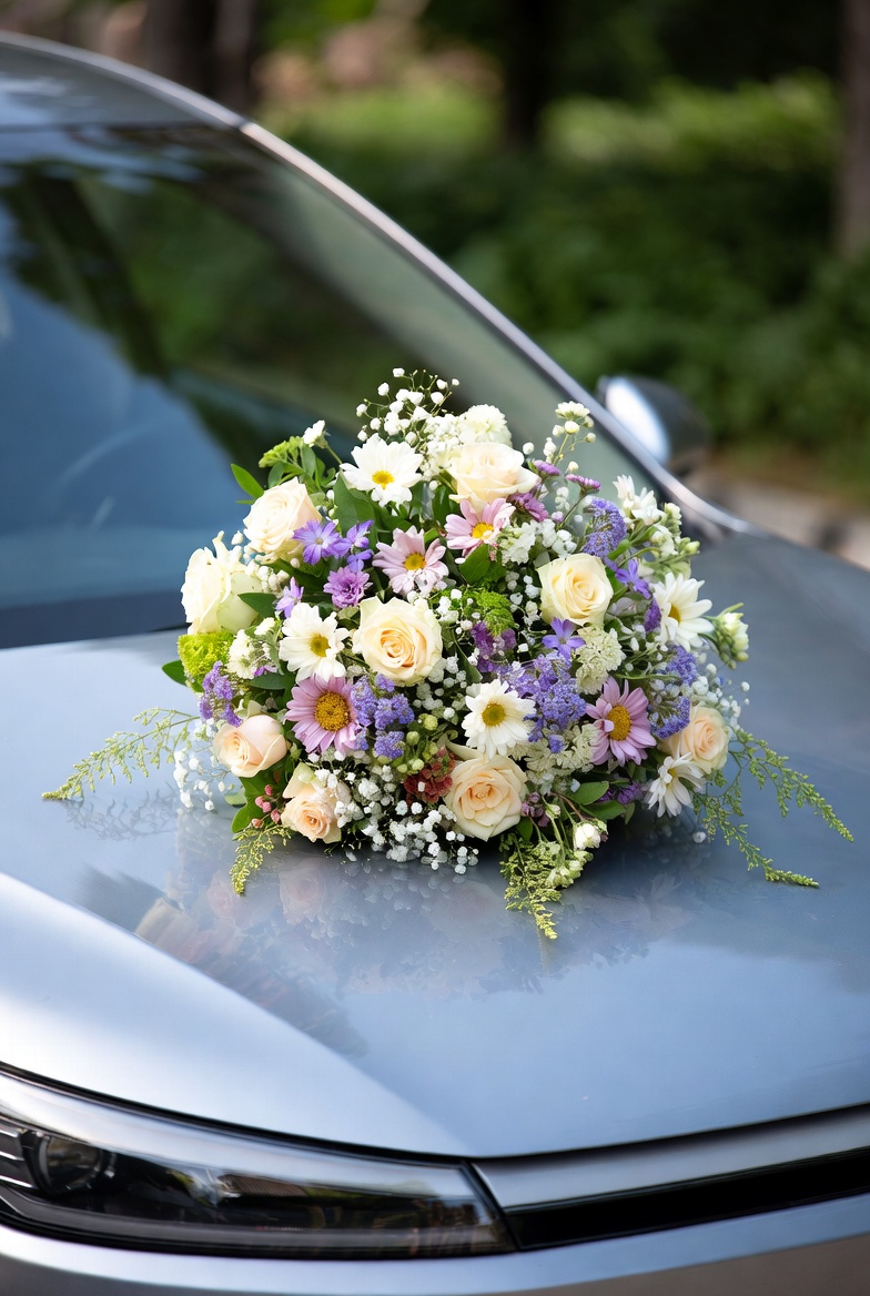 Wedding bouquet on car hood Wedding bouquet on car hood
