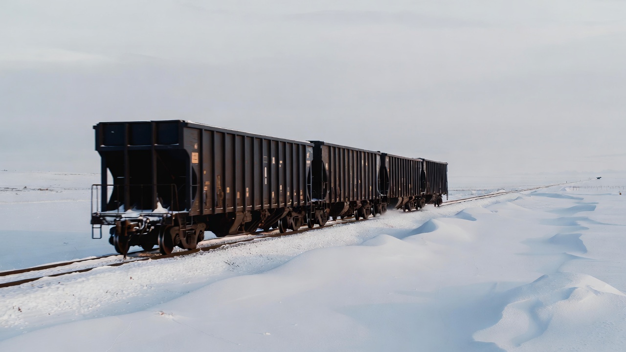Freight Train in Snowy Landscape Freight Train in Snowy Landscape