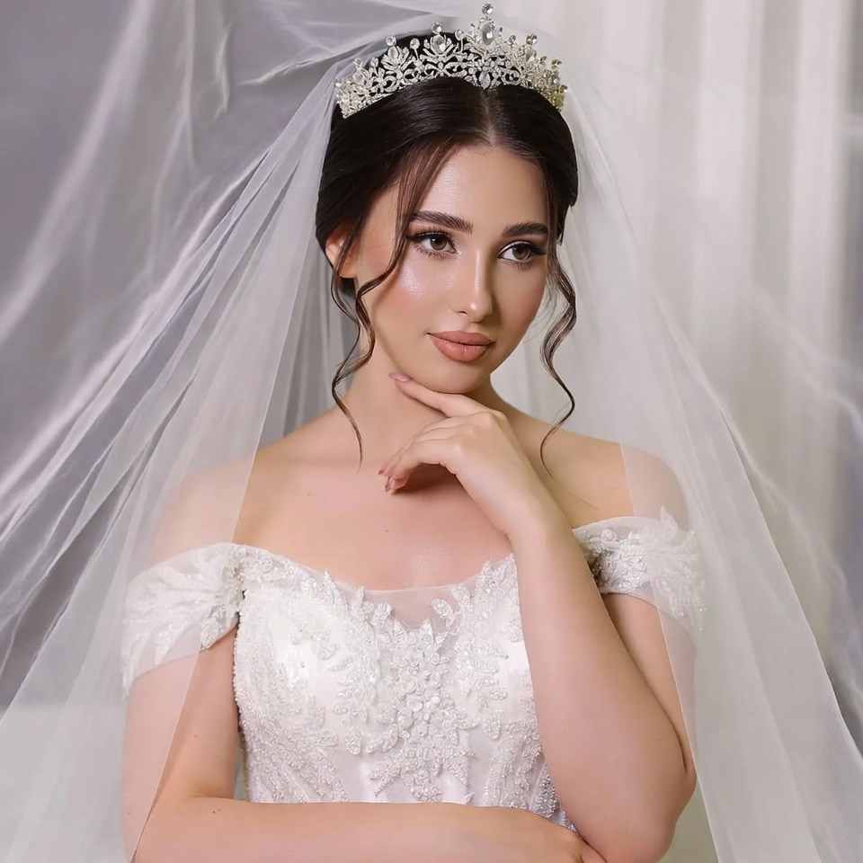 Bride with tiara in white wedding dress Bride with tiara in white wedding dress