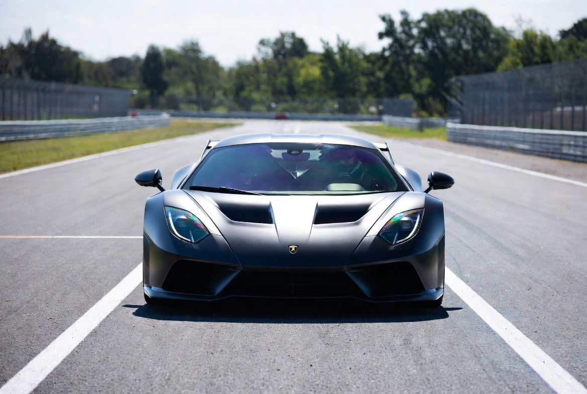Gray Koenigsegg Agera on racetrack Gray Koenigsegg Agera on racetrack