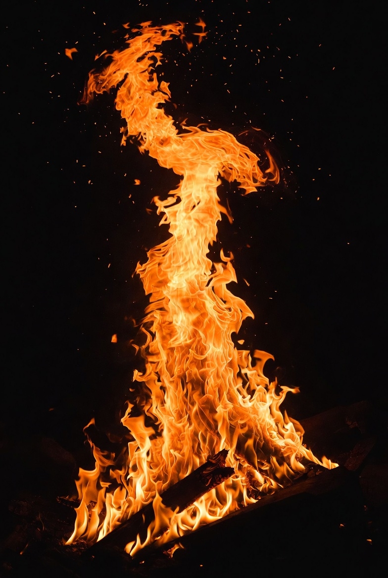 Swirling Flames on Black Background Swirling Flames on Black Background