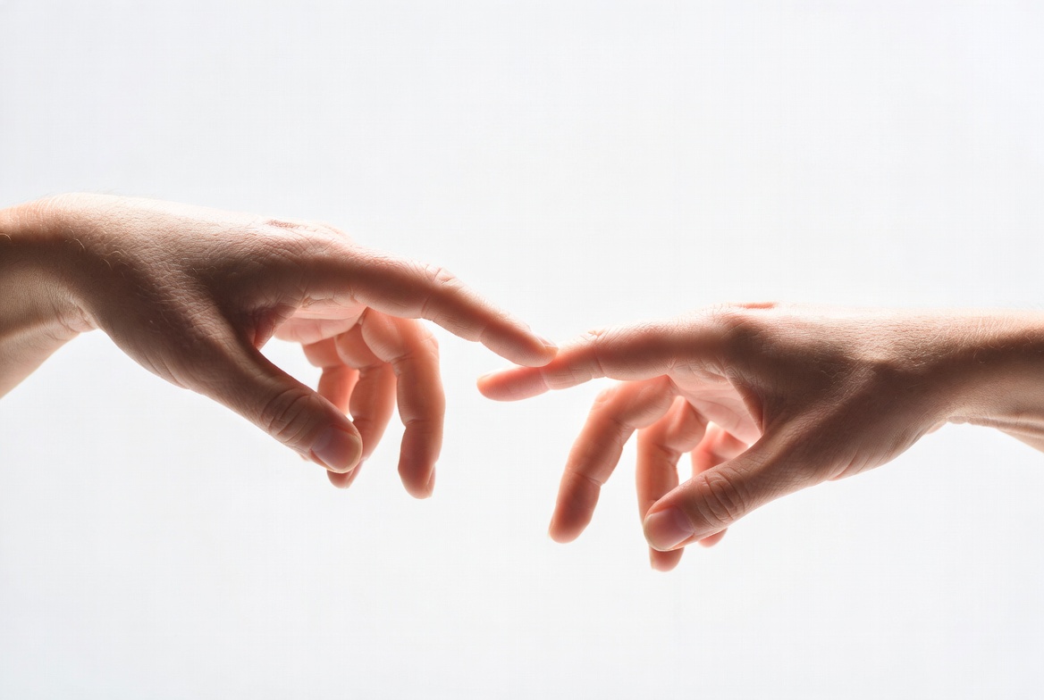 Two hands almost touching Two hands almost touching