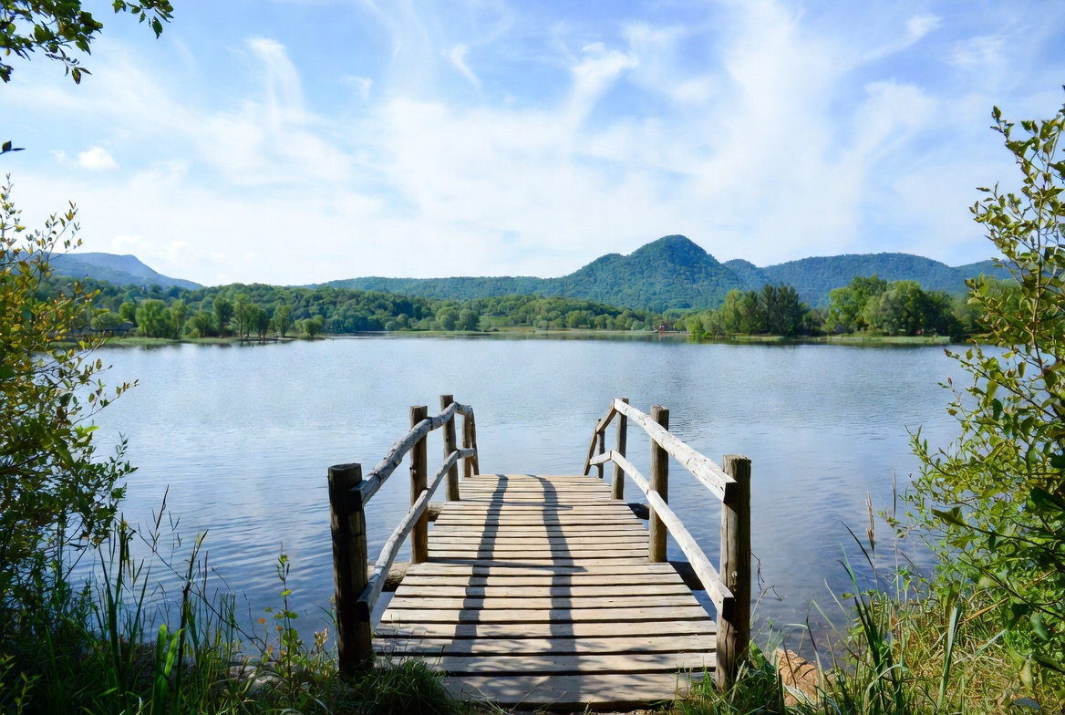Wooden pier over calm lake Wooden pier over calm lake