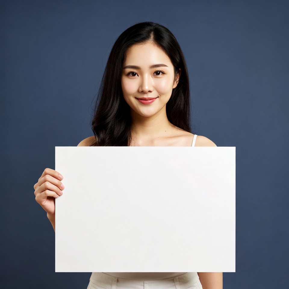Asian woman holding blank sign Asian woman holding blank sign