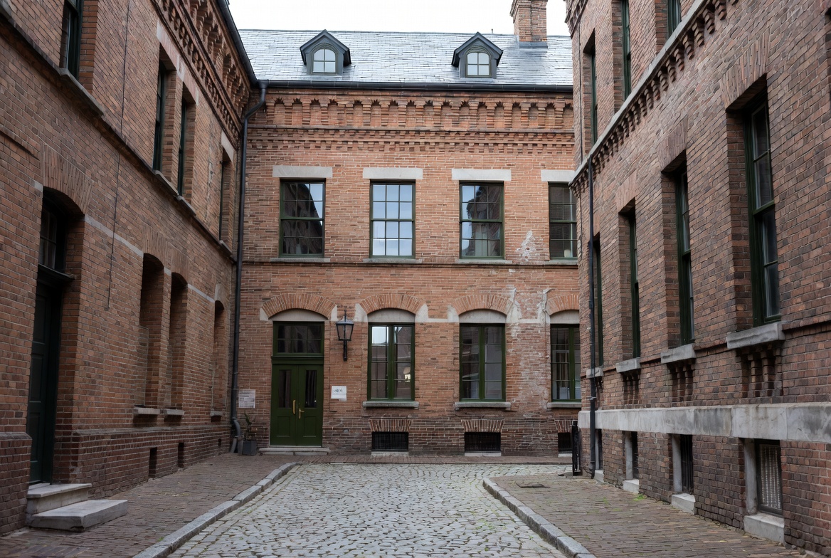 Historic Brick Courtyard with Cobblestone Path Historic Brick Courtyard with Cobblestone Path