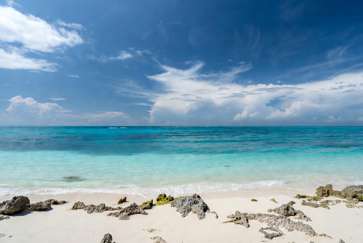 Turquoise Ocean Beach with Rocks Turquoise Ocean Beach with Rocks