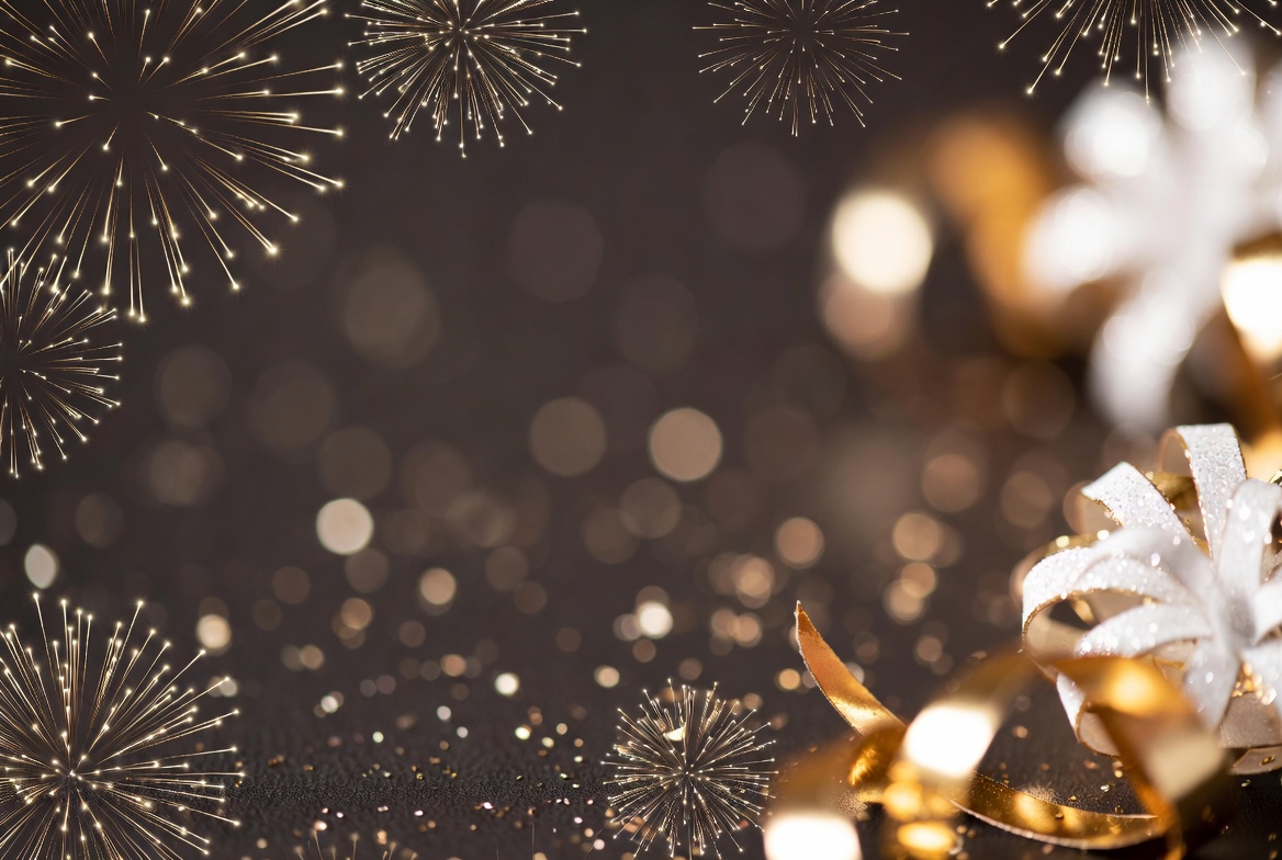 Golden fireworks and white ribbon bow Golden fireworks and white ribbon bow